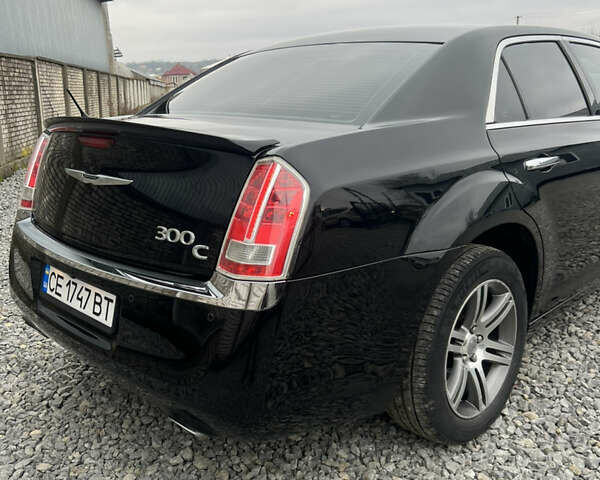 Черный Крайслер 300C, объемом двигателя 2.99 л и пробегом 260 тыс. км за 10800 $, фото 17 на Automoto.ua
