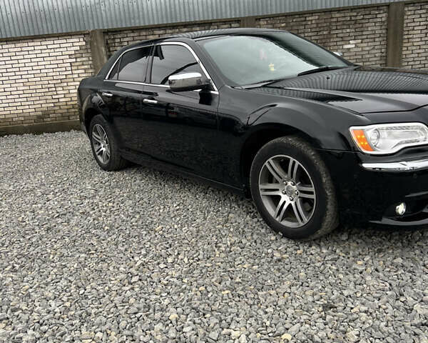 Черный Крайслер 300C, объемом двигателя 2.99 л и пробегом 260 тыс. км за 10800 $, фото 1 на Automoto.ua