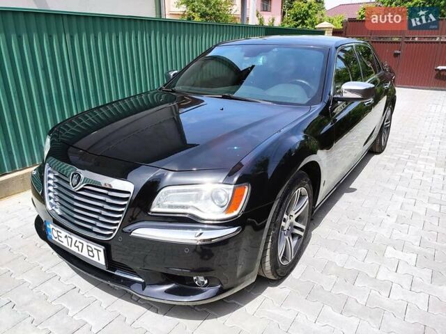 Черный Крайслер 300C, объемом двигателя 3 л и пробегом 259 тыс. км за 13000 $, фото 1 на Automoto.ua