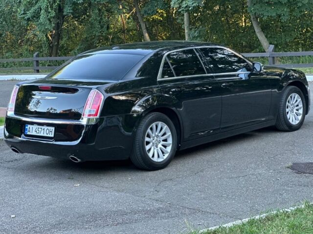 Крайслер 300C 2012 у Києві на Automoto.ua Чорний Крайслер 300C, об'ємом двигуна 3.6 л та пробігом 215 тис. км за 10900 $, фото 3 на Automoto.ua