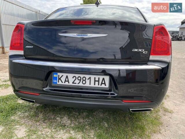 Черный Крайслер 300C, объемом двигателя 3.6 л и пробегом 175 тыс. км за 14900 $, фото 1 на Automoto.ua