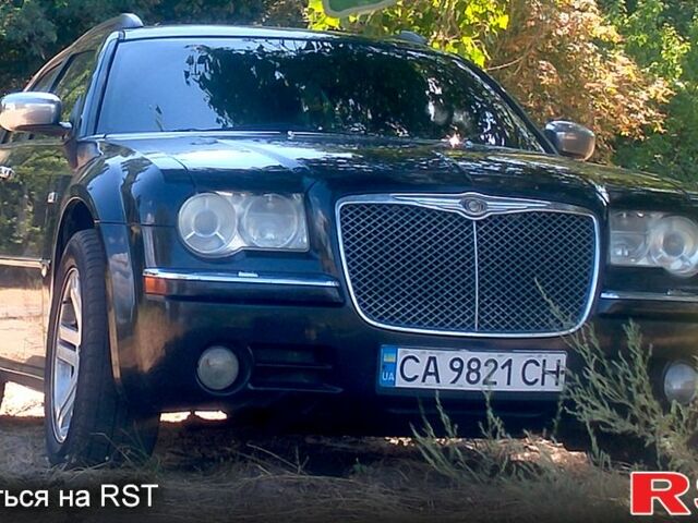 Черный Крайслер 300C, объемом двигателя 35 л и пробегом 325 тыс. км за 9200 $, фото 1 на Automoto.ua