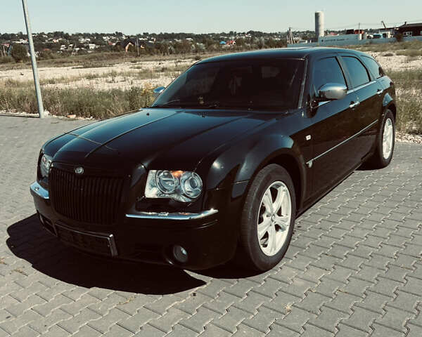 Черный Крайслер 300C, объемом двигателя 3 л и пробегом 300 тыс. км за 7599 $, фото 12 на Automoto.ua