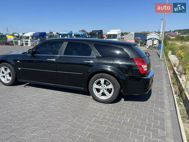 Черный Крайслер 300C, объемом двигателя 3 л и пробегом 300 тыс. км за 7999 $, фото 4 на Automoto.ua