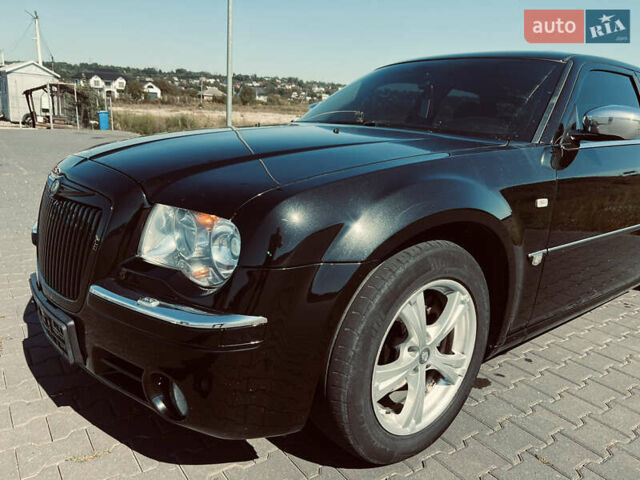 Черный Крайслер 300C, объемом двигателя 3 л и пробегом 300 тыс. км за 7599 $, фото 1 на Automoto.ua
