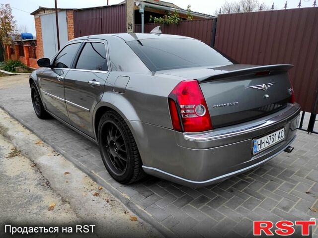 Серый Крайслер 300C, объемом двигателя 2.7 л и пробегом 241 тыс. км за 6800 $, фото 5 на Automoto.ua
