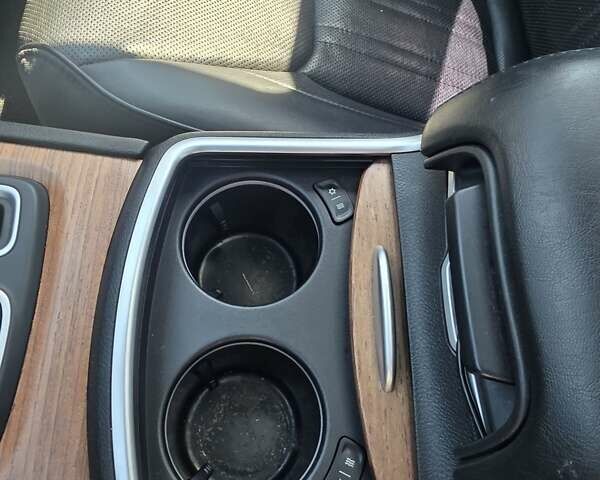 Серый Крайслер 300C, объемом двигателя 5.65 л и пробегом 170 тыс. км за 37000 $, фото 4 на Automoto.ua