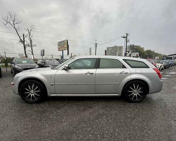 Серый Крайслер 300C, объемом двигателя 5.65 л и пробегом 328 тыс. км за 8999 $, фото 6 на Automoto.ua