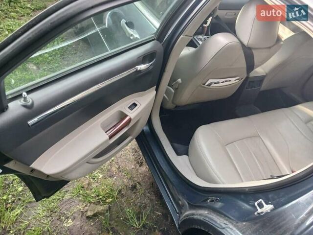 Синий Крайслер 300C, объемом двигателя 3 л и пробегом 398 тыс. км за 6000 $, фото 7 на Automoto.ua