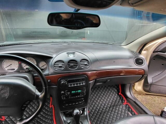 Бежевый Крайслер 300М, объемом двигателя 2.7 л и пробегом 312 тыс. км за 1350 $, фото 9 на Automoto.ua