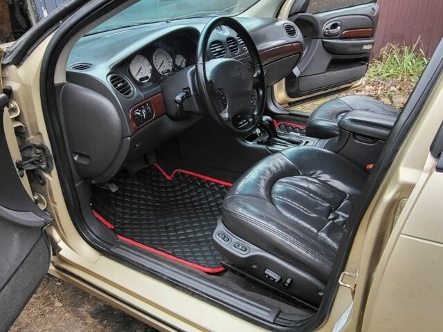 Бежевый Крайслер 300М, объемом двигателя 2.7 л и пробегом 312 тыс. км за 1350 $, фото 8 на Automoto.ua