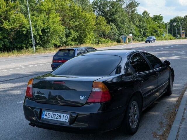 Черный Крайслер 300М, объемом двигателя 2.7 л и пробегом 200 тыс. км за 2731 $, фото 3 на Automoto.ua