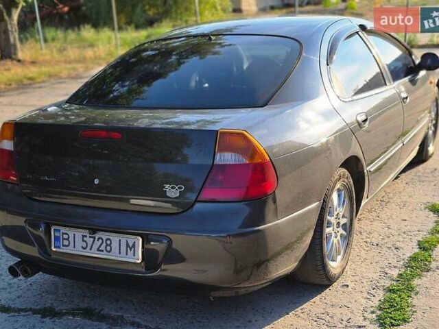 Черный Крайслер 300М, объемом двигателя 3.52 л и пробегом 245 тыс. км за 2700 $, фото 19 на Automoto.ua