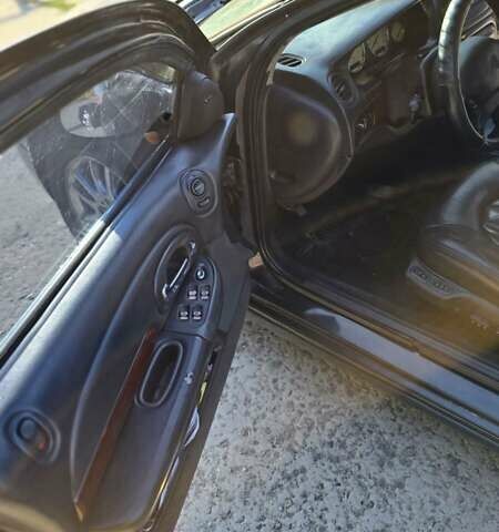 Черный Крайслер 300М, объемом двигателя 3.52 л и пробегом 245 тыс. км за 2700 $, фото 6 на Automoto.ua