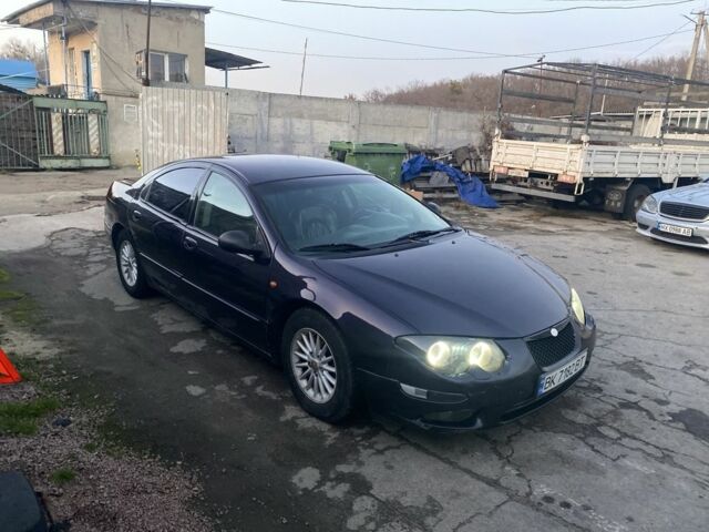 Синий Крайслер 300М, объемом двигателя 3.5 л и пробегом 320 тыс. км за 2999 $, фото 2 на Automoto.ua