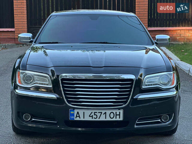 Чорний Крайслер 300, об'ємом двигуна 3.6 л та пробігом 206 тис. км за 10900 $, фото 2 на Automoto.ua