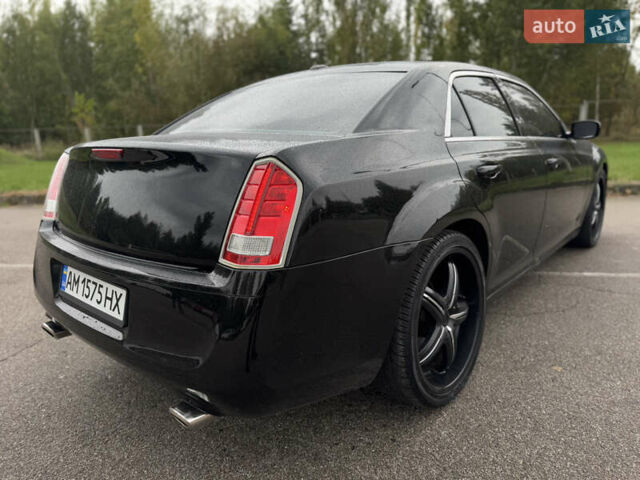 Чорний Крайслер 300, об'ємом двигуна 3.6 л та пробігом 282 тис. км за 10500 $, фото 14 на Automoto.ua