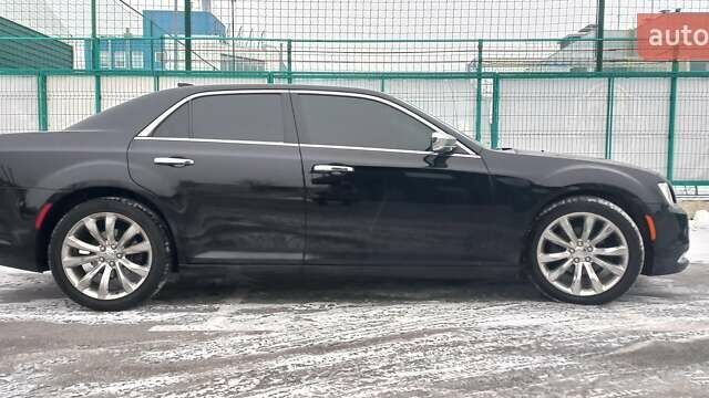 Чорний Крайслер 300, об'ємом двигуна 3.6 л та пробігом 146 тис. км за 14500 $, фото 1 на Automoto.ua