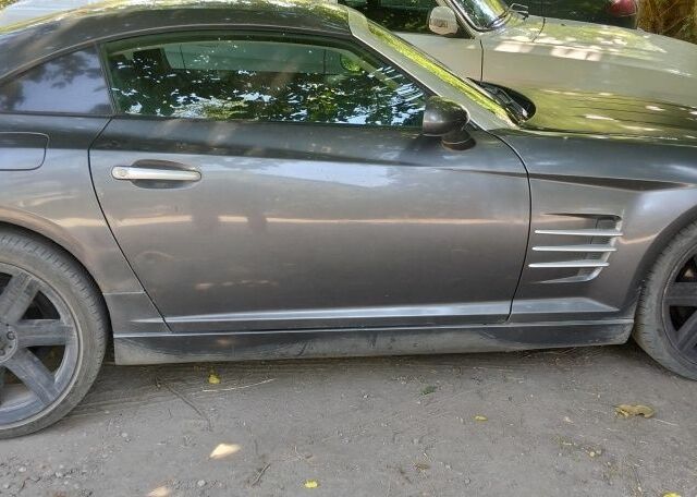 Серый Крайслер Кроссфайр, объемом двигателя 3 л и пробегом 250 тыс. км за 2738 $, фото 12 на Automoto.ua