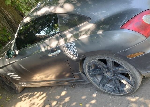 Серый Крайслер Кроссфайр, объемом двигателя 3 л и пробегом 250 тыс. км за 2738 $, фото 5 на Automoto.ua