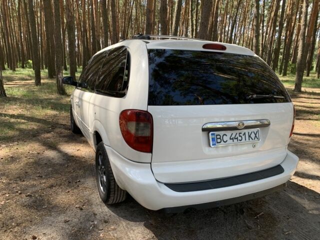 Белый Крайслер Гранд Вояджер, объемом двигателя 2.8 л и пробегом 340 тыс. км за 63000 $, фото 5 на Automoto.ua