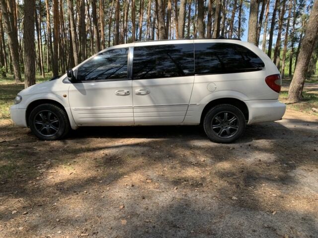 Белый Крайслер Гранд Вояджер, объемом двигателя 2.8 л и пробегом 340 тыс. км за 63000 $, фото 7 на Automoto.ua