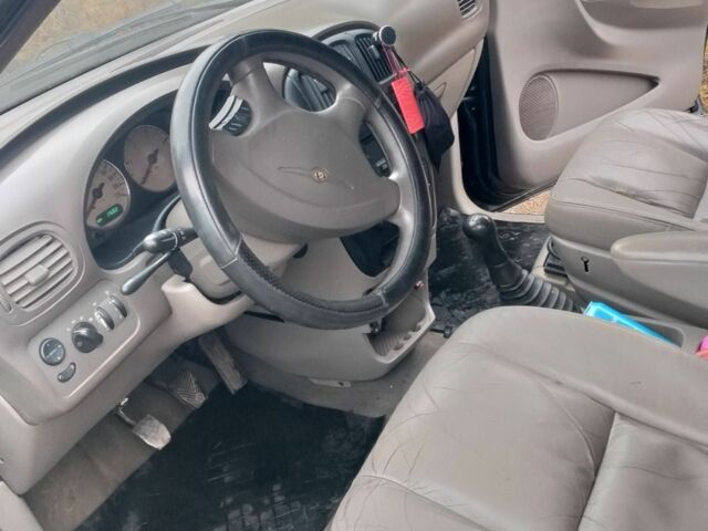 Черный Крайслер Гранд Вояджер, объемом двигателя 2.5 л и пробегом 276 тыс. км за 1593 $, фото 16 на Automoto.ua