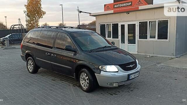 Чорний Крайслер Grand Voyager, об'ємом двигуна 2.5 л та пробігом 250 тис. км за 6500 $, фото 11 на Automoto.ua