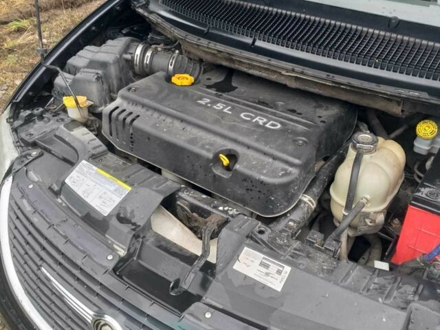 Черный Крайслер Гранд Вояджер, объемом двигателя 2.5 л и пробегом 276 тыс. км за 1593 $, фото 7 на Automoto.ua