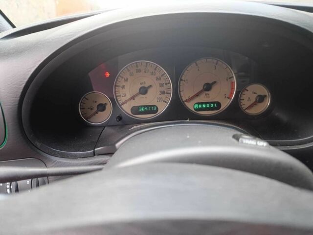 Черный Крайслер Гранд Вояджер, объемом двигателя 2.8 л и пробегом 365 тыс. км за 4200 $, фото 2 на Automoto.ua