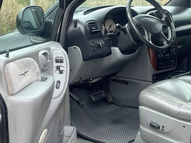 Крайслер Гранд Вояджер 2005 в Могилев-Подольском на Automoto.ua Черный Крайслер Гранд Вояджер, объемом двигателя 2.8 л и пробегом 280 тыс. км за 5900 $, фото 5 на Automoto.ua