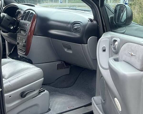 Крайслер Гранд Вояджер 2005 в Могилев-Подольском на Automoto.ua Черный Крайслер Гранд Вояджер, объемом двигателя 2.8 л и пробегом 280 тыс. км за 5900 $, фото 5 на Automoto.ua