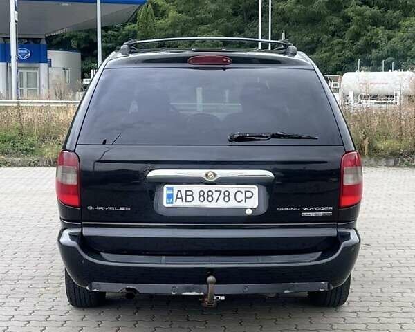 Крайслер Гранд Вояджер 2005 в Могилев-Подольском на Automoto.ua Черный Крайслер Гранд Вояджер, объемом двигателя 2.8 л и пробегом 280 тыс. км за 5900 $, фото 3 на Automoto.ua