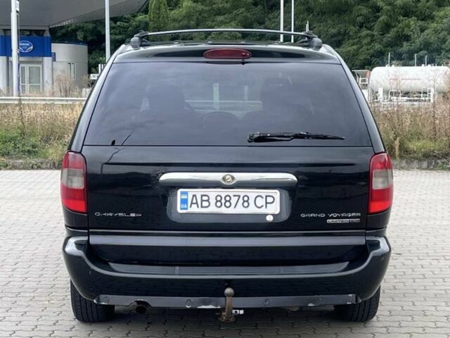 Крайслер Гранд Вояджер 2005 в Могилев-Подольском на Automoto.ua Черный Крайслер Гранд Вояджер, объемом двигателя 2.8 л и пробегом 280 тыс. км за 5900 $, фото 4 на Automoto.ua