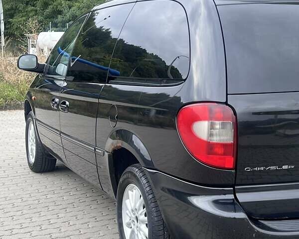 Чорний Крайслер Grand Voyager, об'ємом двигуна 2.8 л та пробігом 281 тис. км за 6399 $, фото 8 на Automoto.ua