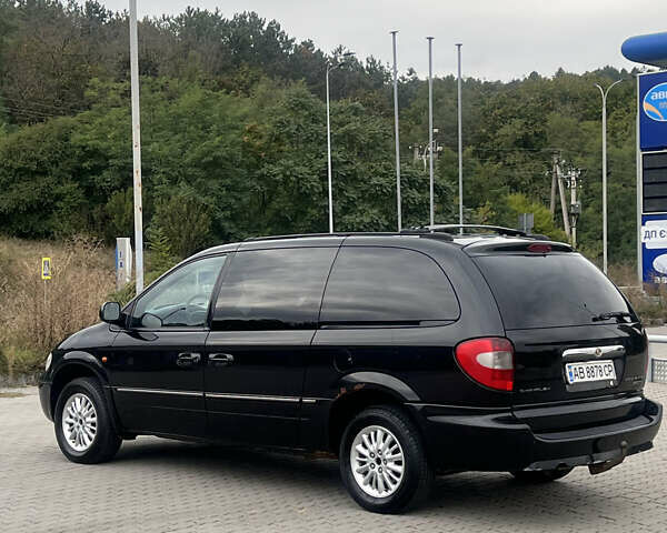 Чорний Крайслер Grand Voyager, об'ємом двигуна 2.8 л та пробігом 281 тис. км за 6399 $, фото 4 на Automoto.ua