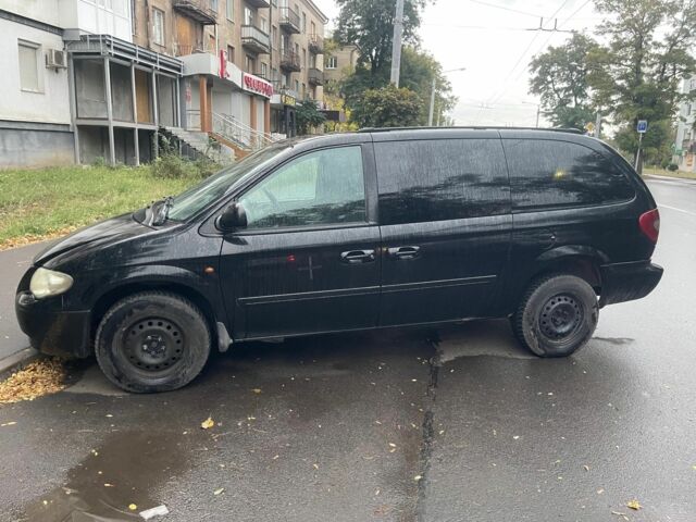 Черный Крайслер Гранд Вояджер, объемом двигателя 0 л и пробегом 200 тыс. км за 3093 $, фото 1 на Automoto.ua