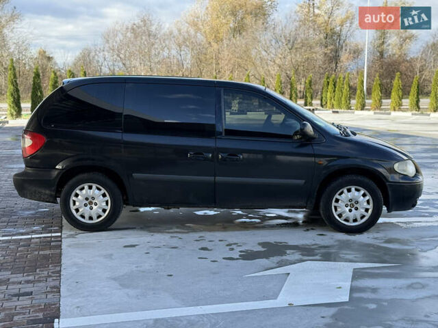 Черный Крайслер Гранд Вояджер, объемом двигателя 2.5 л и пробегом 320 тыс. км за 2999 $, фото 5 на Automoto.ua