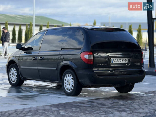 Черный Крайслер Гранд Вояджер, объемом двигателя 2.5 л и пробегом 320 тыс. км за 2999 $, фото 2 на Automoto.ua
