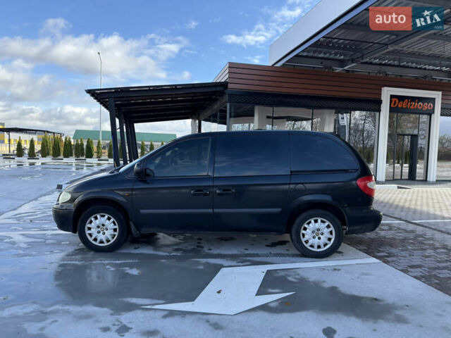 Черный Крайслер Гранд Вояджер, объемом двигателя 2.5 л и пробегом 320 тыс. км за 2999 $, фото 4 на Automoto.ua