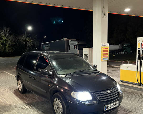 Черный Крайслер Гранд Вояджер, объемом двигателя 2.5 л и пробегом 320 тыс. км за 2999 $, фото 24 на Automoto.ua