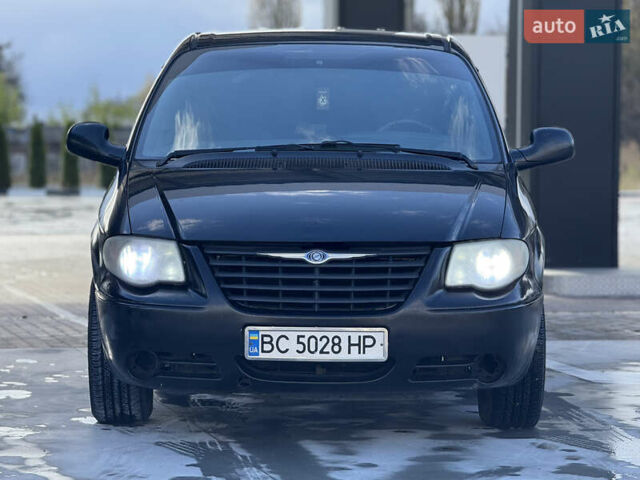 Черный Крайслер Гранд Вояджер, объемом двигателя 2.5 л и пробегом 320 тыс. км за 2999 $, фото 7 на Automoto.ua