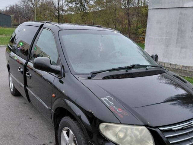 Черный Крайслер Гранд Вояджер, объемом двигателя 2.8 л и пробегом 334 тыс. км за 6000 $, фото 3 на Automoto.ua