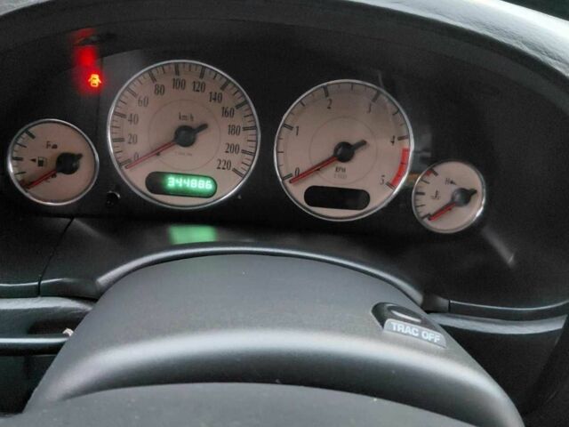 Черный Крайслер Гранд Вояджер, объемом двигателя 2.8 л и пробегом 334 тыс. км за 6000 $, фото 1 на Automoto.ua