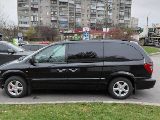Черный Крайслер Гранд Вояджер, объемом двигателя 2.8 л и пробегом 334 тыс. км за 6000 $, фото 5 на Automoto.ua