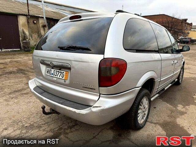 Серый Крайслер Гранд Вояджер, объемом двигателя 2.5 л и пробегом 289 тыс. км за 2500 $, фото 5 на Automoto.ua