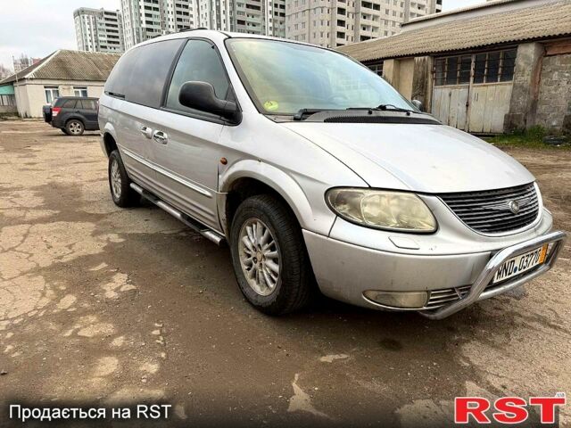 Серый Крайслер Гранд Вояджер, объемом двигателя 2.5 л и пробегом 289 тыс. км за 2500 $, фото 3 на Automoto.ua