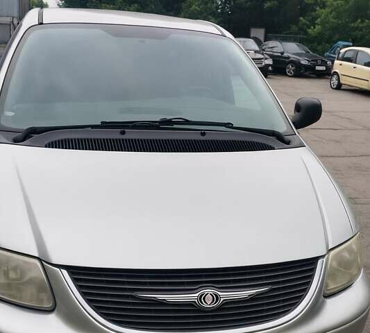 Серый Крайслер Гранд Вояджер, объемом двигателя 0 л и пробегом 300 тыс. км за 2500 $, фото 1 на Automoto.ua