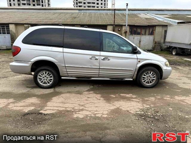 Серый Крайслер Гранд Вояджер, объемом двигателя 2.5 л и пробегом 289 тыс. км за 2500 $, фото 4 на Automoto.ua