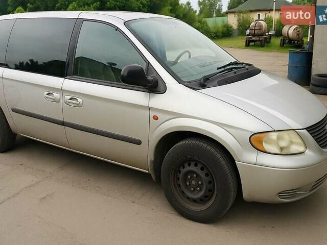 Серый Крайслер Гранд Вояджер, объемом двигателя 0 л и пробегом 300 тыс. км за 2500 $, фото 2 на Automoto.ua